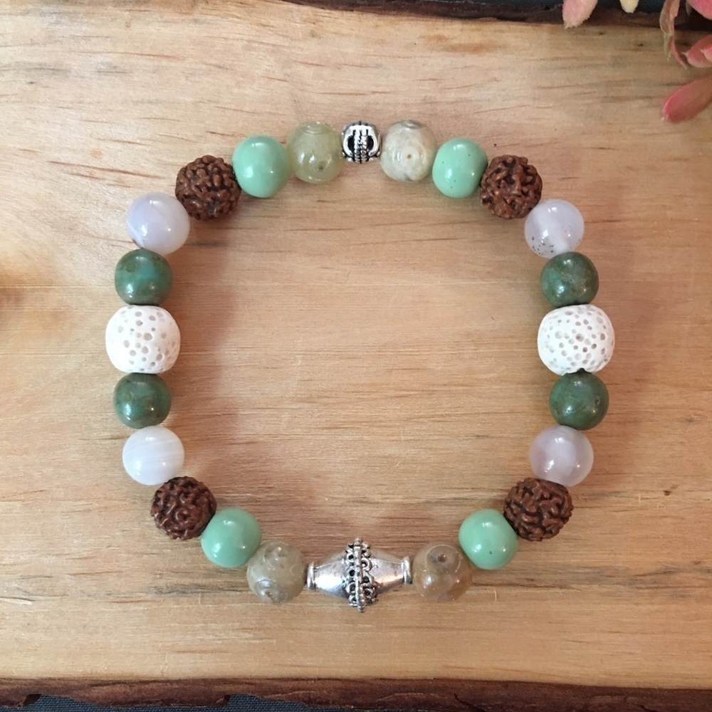 White, silver, green and browns beaded bracelet
